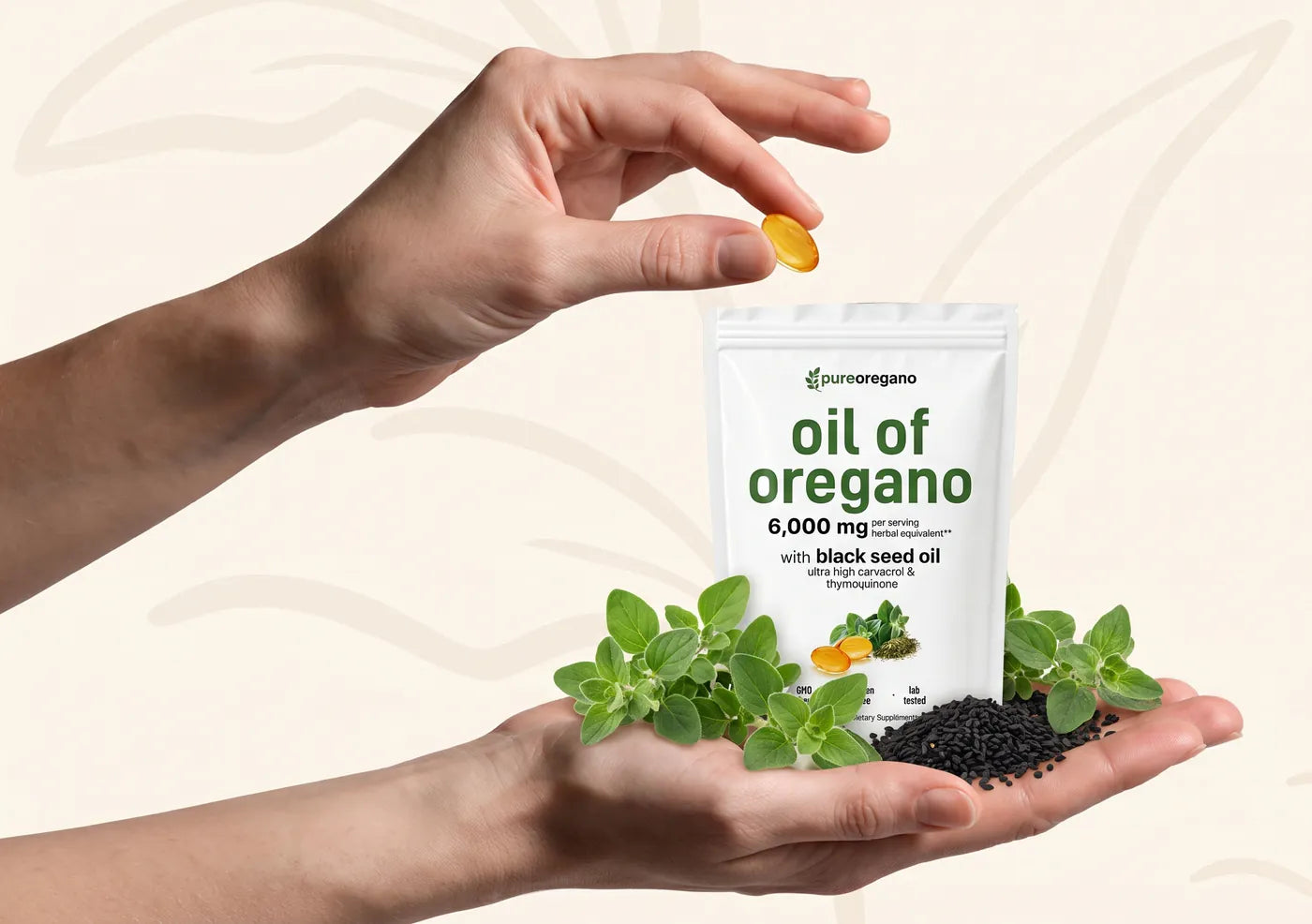 Hand dropping a golden softgel into a Pure Oregano pouch resting on a palm with fresh oregano and black seeds